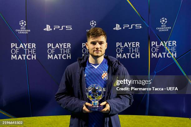 Martin Baturina of GNK Dinamo poses for a photo with the PlayStation Player Of The Match award after the UEFA Champions League 2024/25 League Phase...