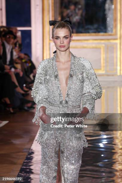 Model walks the runway during the Zuhair Murad Haute Couture Spring-Summer 2025 show as part of Paris Fashion Week on January 29, 2025 in Paris,...