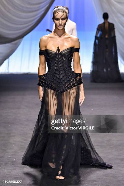 Rosie Huntington Whiteley walks the runway during the Jean Paul Gaultier by Ludovic de Saint Sernin Haute Couture Spring/Summer 2025 fashion show as...