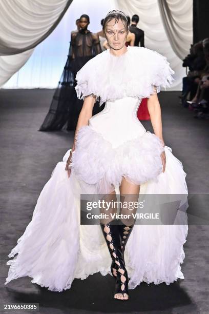 Candice Swanepoel walks the runway during the Jean Paul Gaultier by Ludovic de Saint Sernin Haute Couture Spring/Summer 2025 fashion show as part of...
