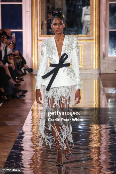 Model walks the runway during the Zuhair Murad Haute Couture Spring-Summer 2025 show as part of Paris Fashion Week on January 29, 2025 in Paris,...