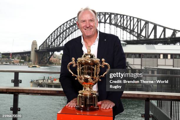 World Rugby Chair, Brett Robinson poses with the Webb Ellis Cup during a media opportunity as World Rugby announce the host cities for Men's Rugby...