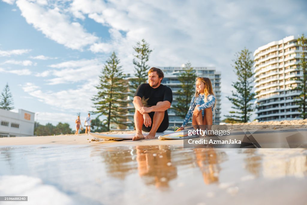 Father and Daughter on the Gold Coast Beach at Sunrise