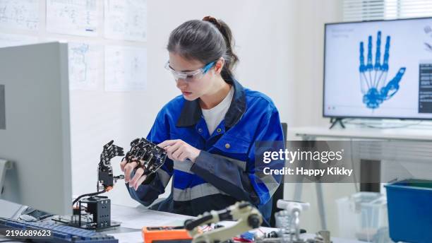 White Woman Engineer Developer In Robotics Arm Prototype Demonstrating ...