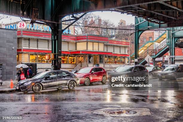 diner in art nouveau style on a rainy day - queens day stockfoto's en -beelden