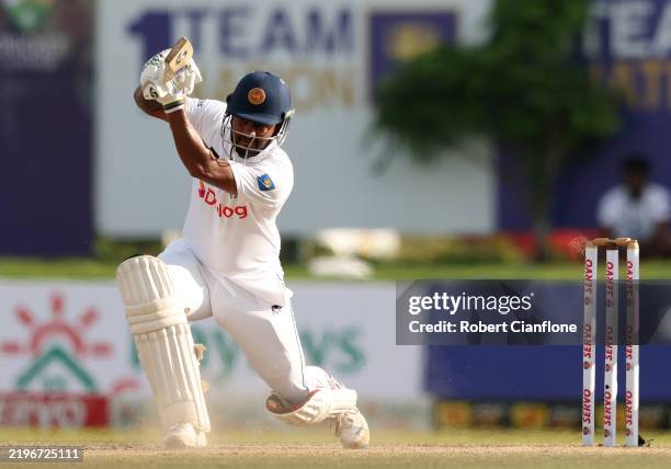 Dimuth Karunaratne of Sri Lanka bats sduring day two of the First Test match in the series between Sri Lanka and Australia at Galle International...