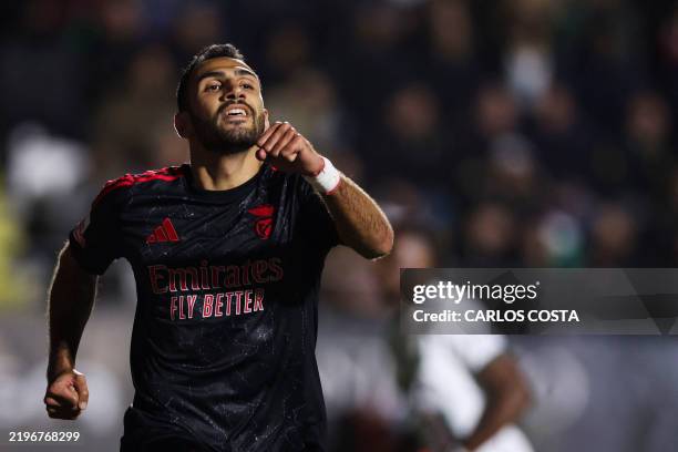 Benfica's Greek forward Vangelis Pavlidis celebrates scoring his team's third goal during the Portuguese league football match between CF Estrela da...