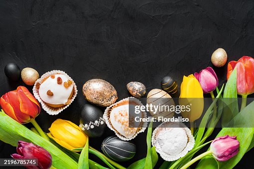 Easter painted multi-colored eggs and Easter cake Easter painted multi-colored eggs and Easter cake