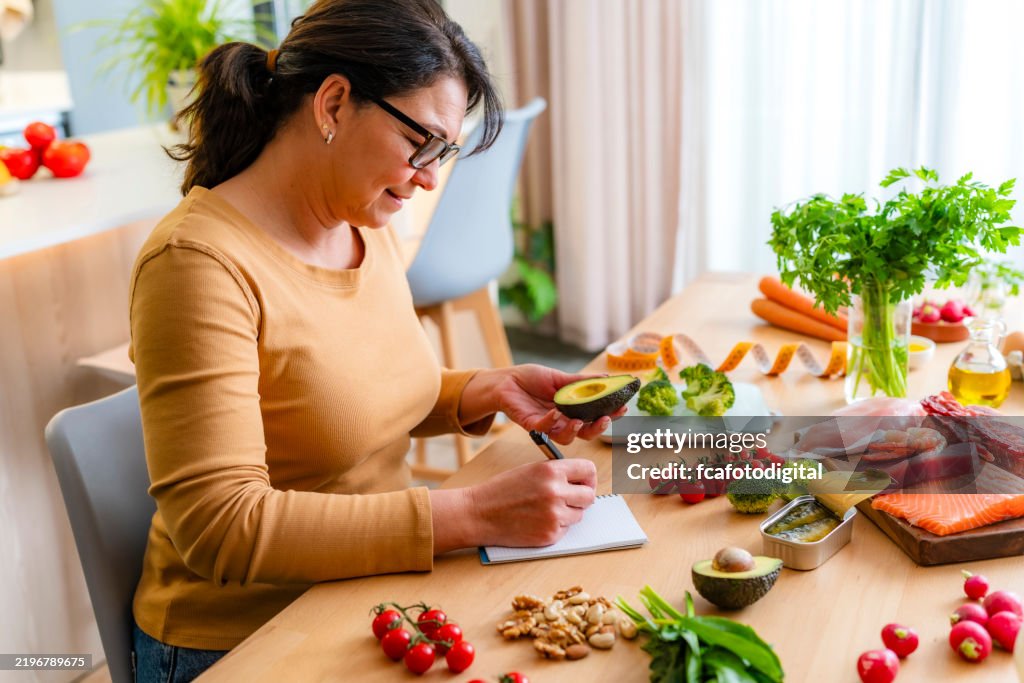 Mature woman planning a healthy protein diet
