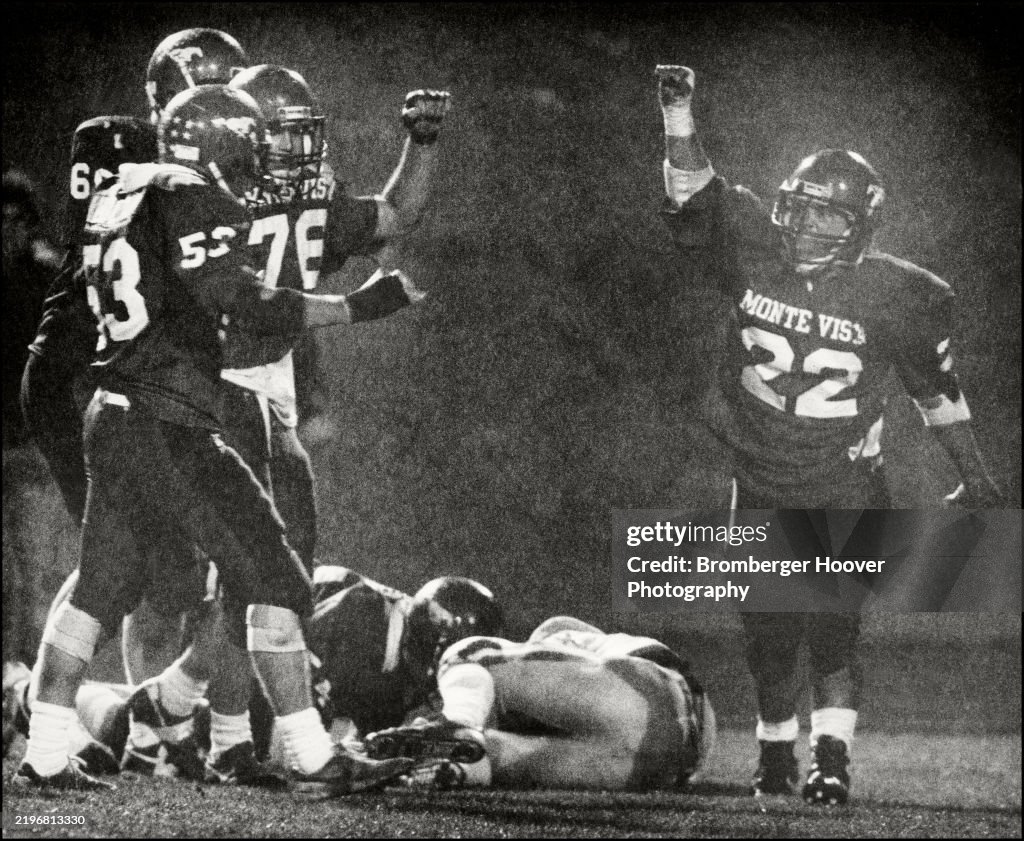 Monte Vista High School Football Players Celebrate In The Rain
