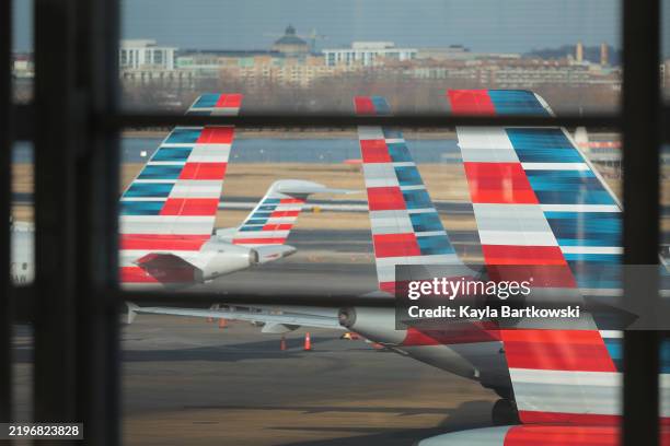 American Airlines aircraft sit on the tarmac at Ronald Reagan Washington National Airport on January 30, 2025 in Arlington, Virginia. Yesterday...