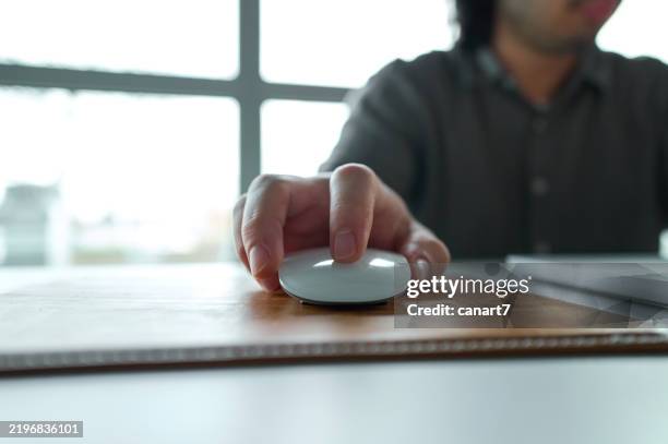 office worker using computer mouse at desk - computer mouse close up stock pictures, royalty-free photos & images