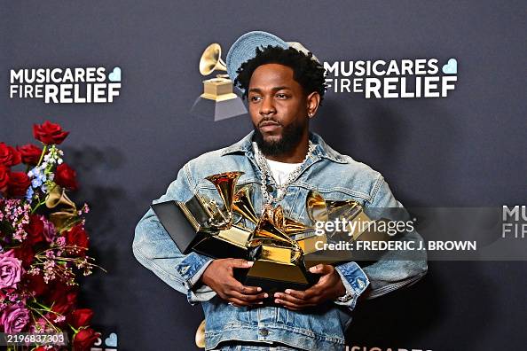 Lama Raper US rapper Kendrick Lamar poses with the Record Of The Year, Best Rap ...