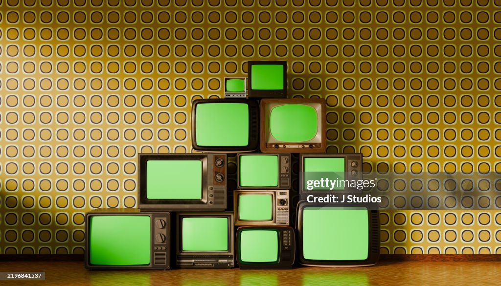 Pyramid Stack of Retro TVs with Green Screens – Vintage Aesthetic with Shiny Wood Floor