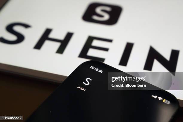 The Shein application icon arranged on a smartphone and a computer in Shanghai, China, on Monday, Feb. 3, 2025. President Donald Trump's new trade...