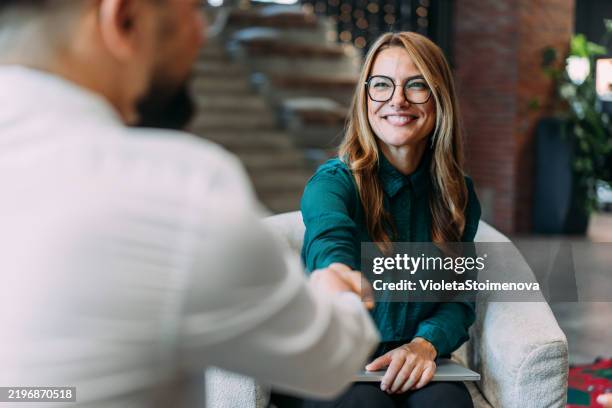 successful partnership. - new hire stock pictures, royalty-free photos & images