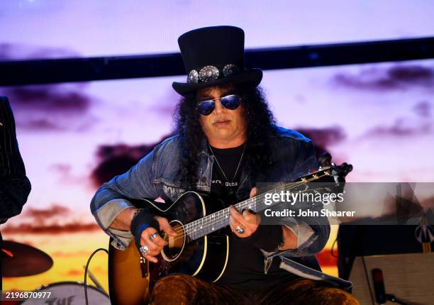 Slash performs onstage during the FIREAID Benefit Concert for California Fire Relief at The Kia Forum on January 30, 2025 in Inglewood, California.