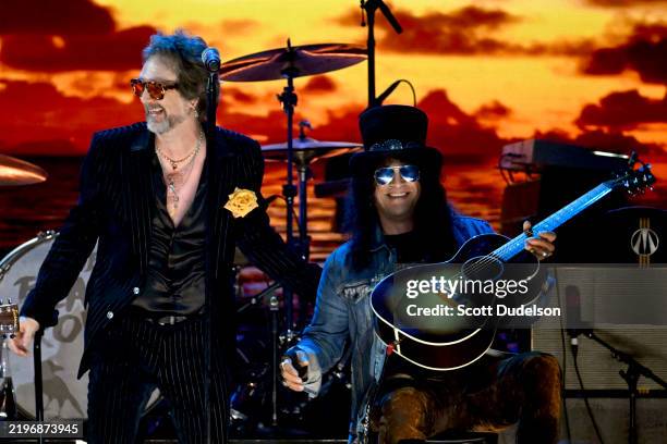 Chris Robinson of The Black Crowes and Slash perform onstage during the FIREAID Benefit Concert for California Fire Relief at The Kia Forum on...