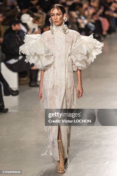 Model walks the runway during the Juana Martin Haute Couture Spring/Summer 2025 fashion show as part of the Paris Haute Couture Fashion Week on...