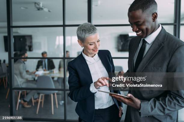 business people in the office. - business relationship stock pictures, royalty-free photos & images
