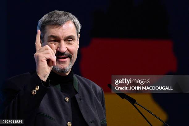 Bavaria's State Premier and leader of the conservative Christian Social Union Markus Soeder gestures as he addresses delegates during the Christian...