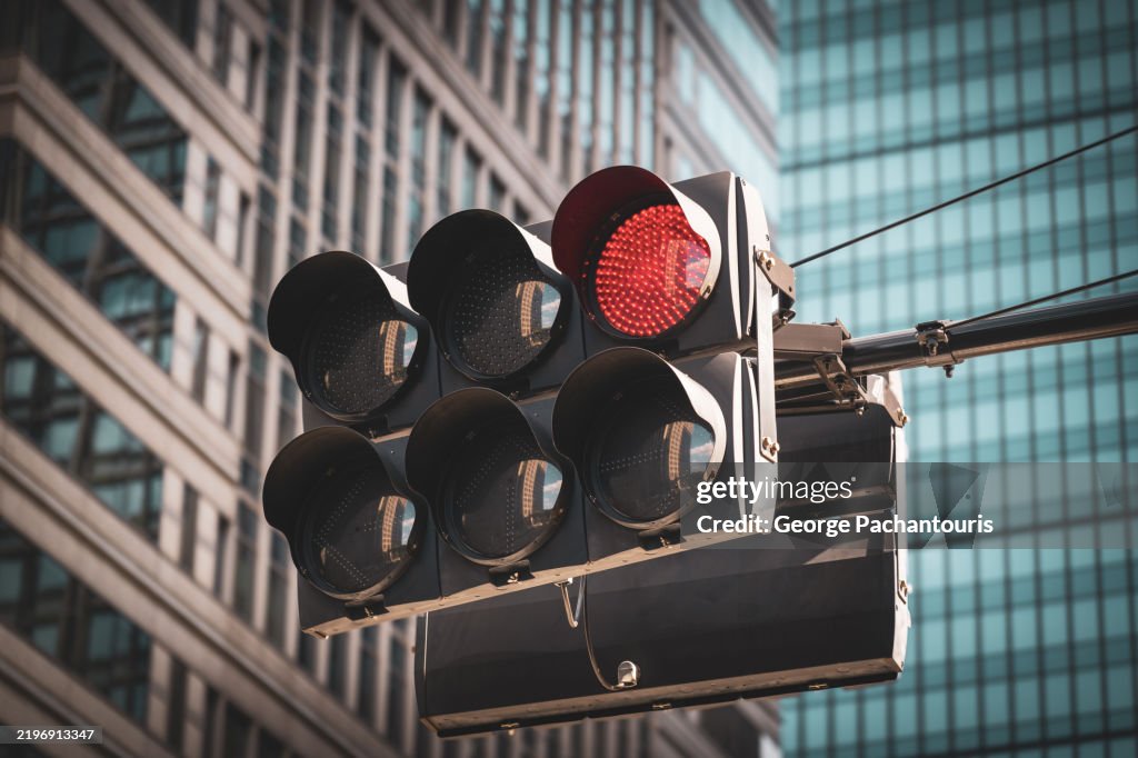 Red traffic light in urban setting
