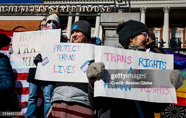 Trans Rights Rally Signs Demonstrators hold signs supporting transgender rights during a rally ...