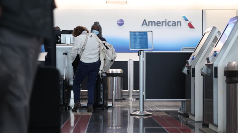 Air Check In 41 American Airlines Passenger Check In Stock Videos, Footage, & 4K ...