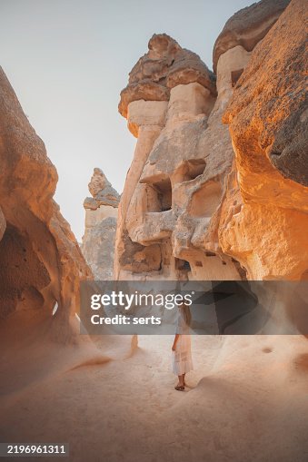 Solo Traveler Exploring the Ancient Rock Formations of Pasabag, Cappadocia, Turkey Solo Traveler Exploring the Ancient Rock Formations of Pasabag, Cappadocia, Turkey