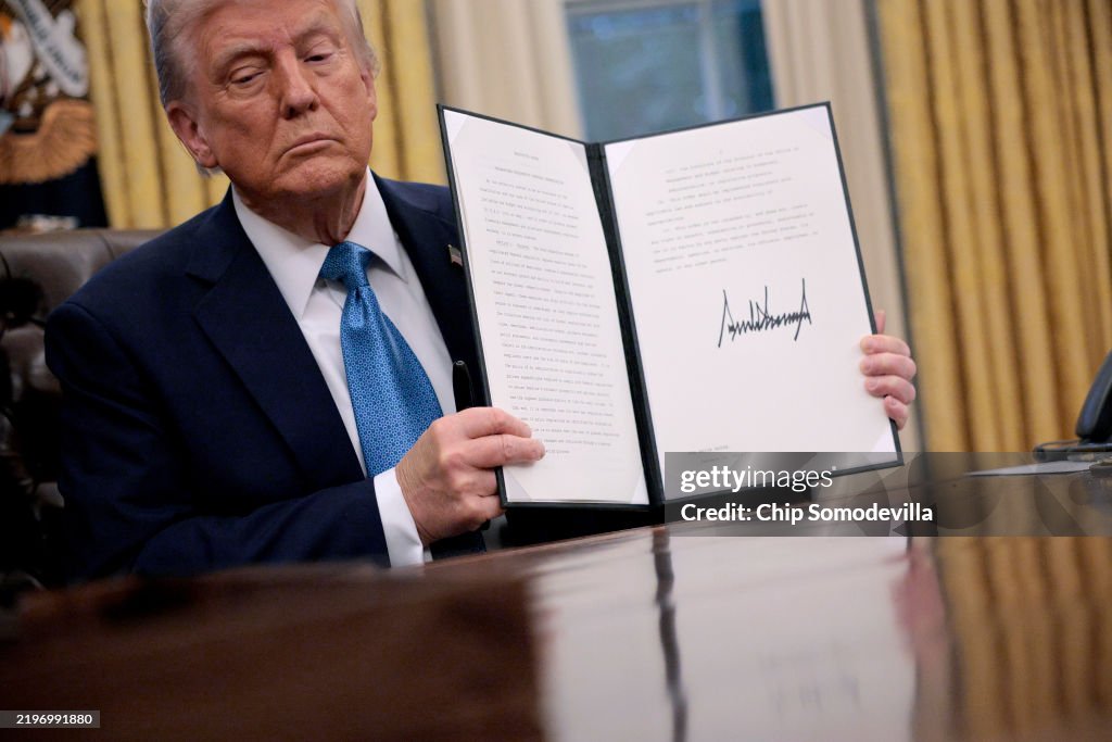 President Trump Signs Executive Orders In The Oval Office