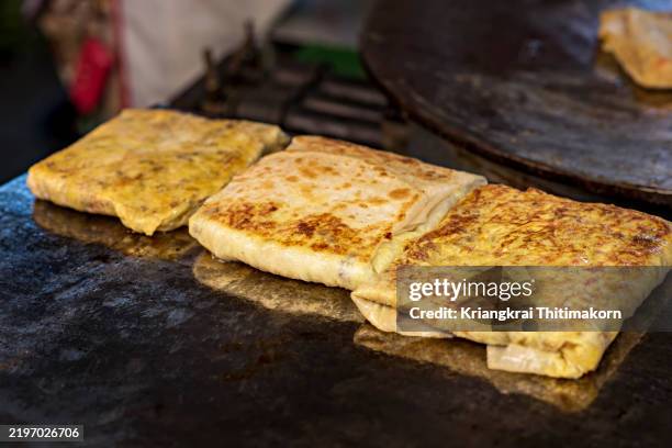 delicious roti-murtaba for snack time. - mataba photos et images de collection