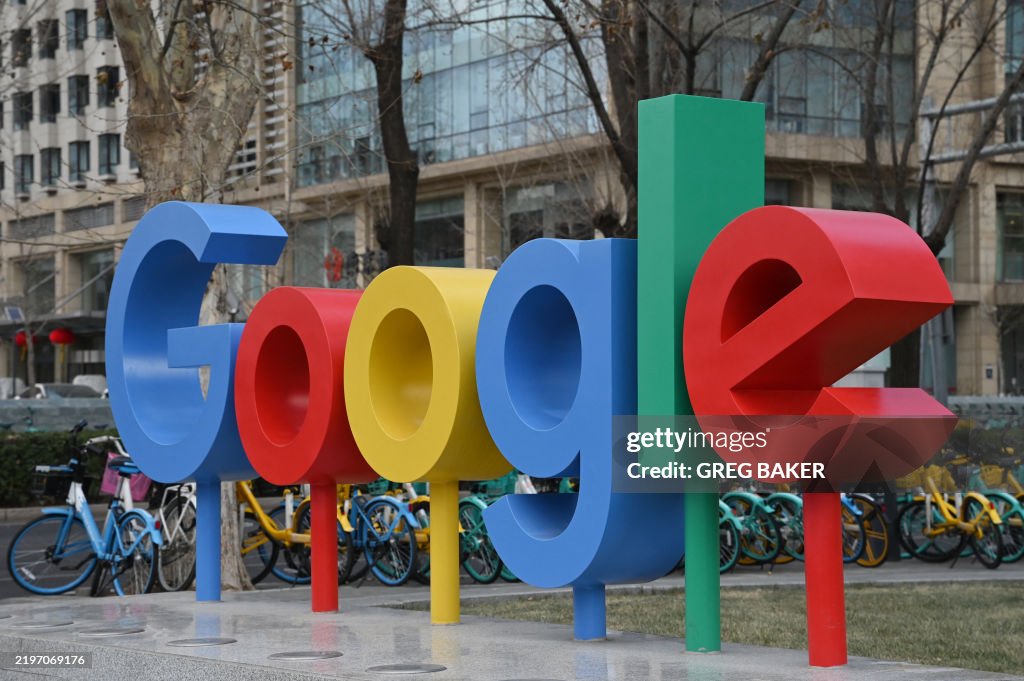 Google Outside The Google logo is seen outside a building housing Google offices in ...