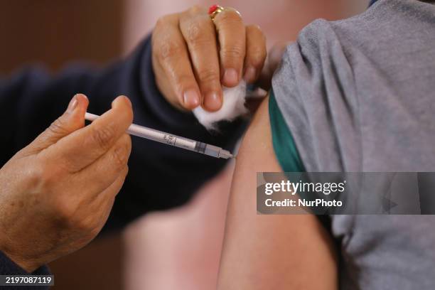 Nepali student receives a dose of the Human Papillomavirus Vaccine at a local school in Kathmandu, Nepal, on February 4, 2025. The vaccination...