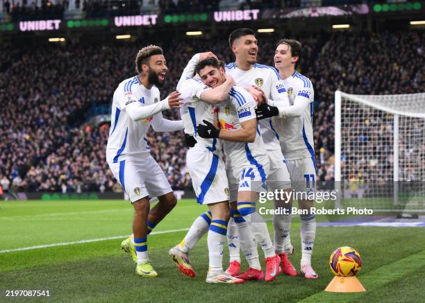 Manor Solomon of Leeds United celebrates scoring his team's second goal with teammates during the Sky Bet Championship match between Leeds United FC...