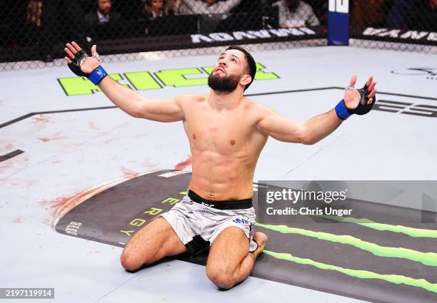 Nassourdine Imavov of Russia reacts after a knockout victory against Israel Adesanya of Nigeria in a middleweight fight during the UFC Fight Night...