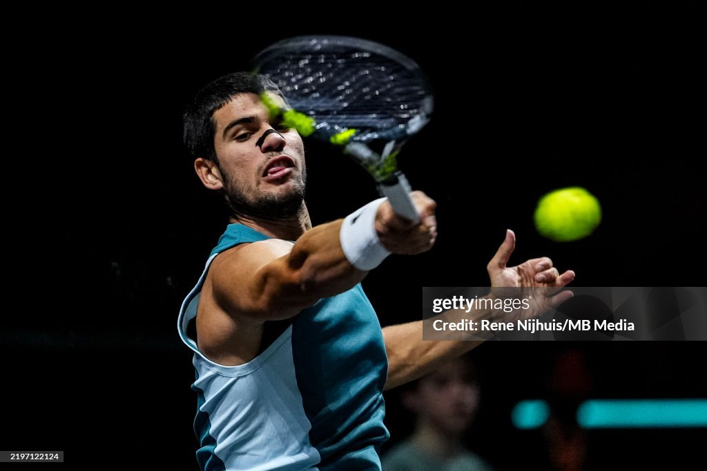 Amro 2 Carlos Alcaraz of Spain plays a forehand in his Men's Singles First ...