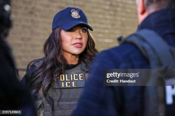 In this handout photo provided by U.S. Immigration and Customs Enforcement, the New York City Fugitive Operations Team, joined by DHS Secretary...