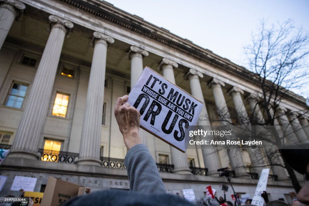 Rally Held At Treasury Department Protesting Elon Musk's Access To Agency Data