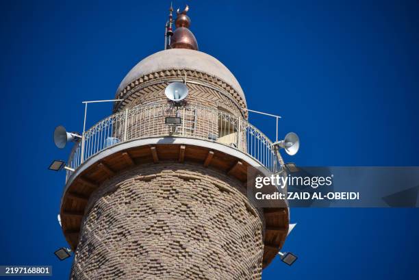 Picture shows a view of the historic Great Mosque of Al-Nuri's "Al-Hadba" leaning minaret, which dates back to the 12th century and was destroyed by...