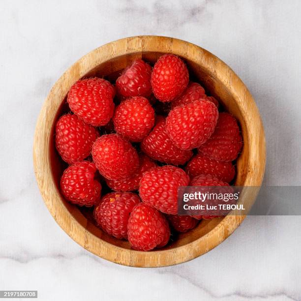 raspberry top view in a wooden ramekin - square ramekin stock pictures, royalty-free photos & images