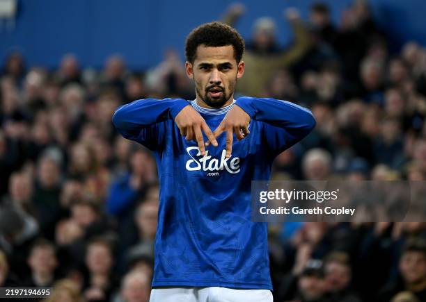 Iliman Ndiaye of Everton celebrates scoring his team's fourth goal with teammates during the Premier League match between Everton FC and Leicester...