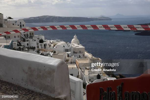Police cordon blocks access to an area in Santorini as earthquake fears prompt heightened safety measures in Santorini, Greece on February 05, 2025....