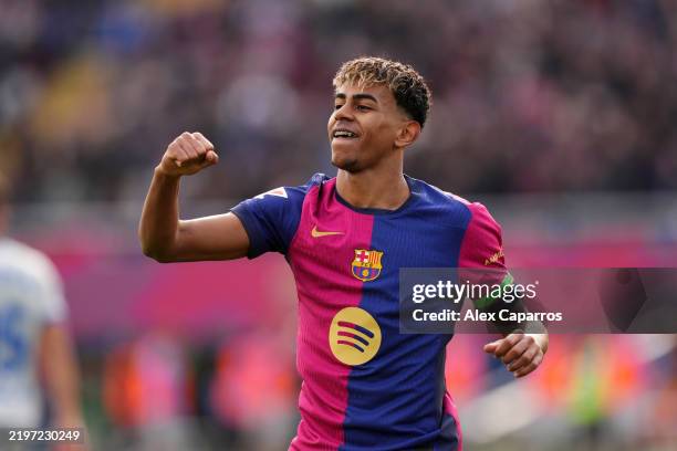 Lamine Yamal of FC Barcelona celebrates after Robert Lewandowski scores his team's first goal during the LaLiga match between FC Barcelona and...