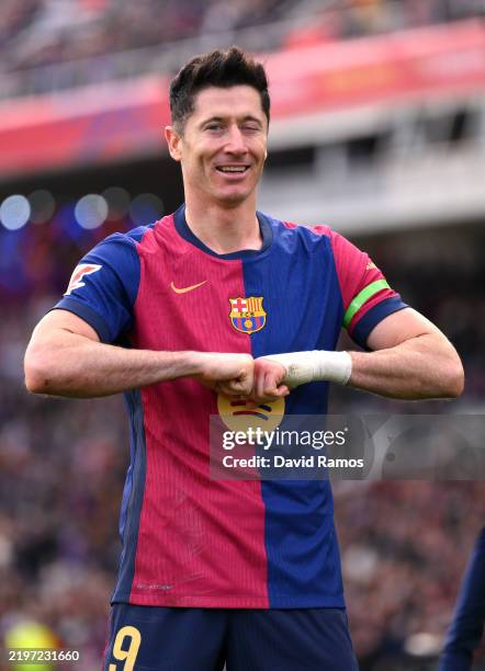 Robert Lewandowski of FC Barcelona celebrates scoring his team's first goal during the LaLiga match between FC Barcelona and Deportivo Alaves at...