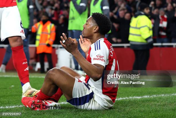 Myles Lewis-Skelly of Arsenal celebrates scoring his team's third goal during the Premier League match between Arsenal FC and Manchester City FC at...