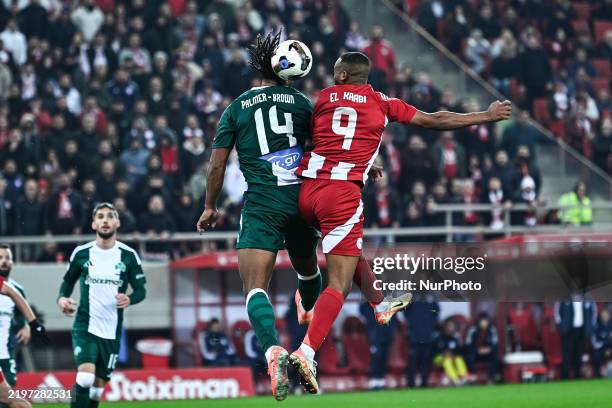 Ayoub El Kaabi of Olympiacos FC competes with Erik Palmer-Browne of Panathinaikos FC during the Greek Cup, Quarter Final, Leg 2 of 2 match between...