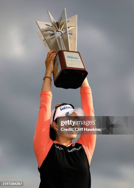 Lim Kim of South Korea poses with the trophy after winning the final round of the Hilton Grand Vacations Tournament of Champions 2025 at Lake Nona...