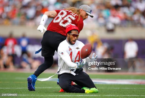Marlon Humphrey of the Baltimore Ravens intercepts a pass intended for George Kittle of the San Francisco 49ers during the second quarter in the NFL...