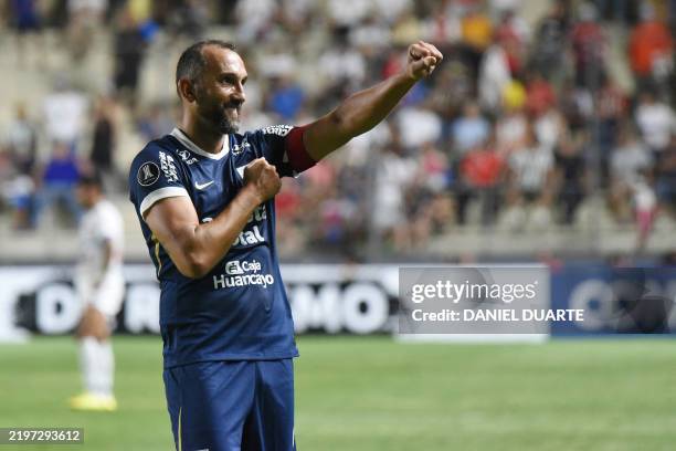 Alianza Lima's Argentine forward Hernan Barcos celebrates after scoring a goal during the Copa Libertadores qualification first round first leg...