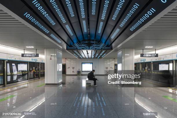 Sequences of binary numbers on the ceiling of a subway station near the Alibaba Group Holding Ltd. Headquarters in Hangzhou, China, on Thursday, Feb....